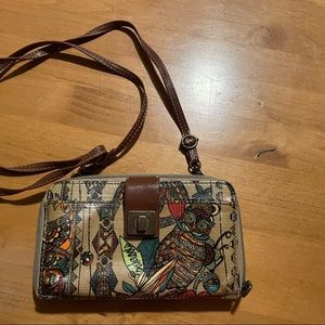 The Sak Sakroots crossbody wallet.